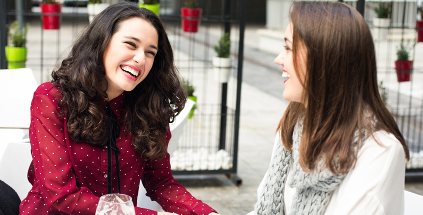 Two women talking